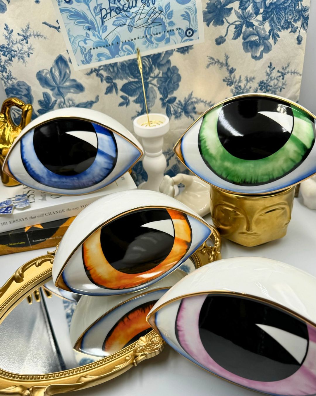 All-Seeing Eye Porcelain Paperweights in blue, green, orange and pink
