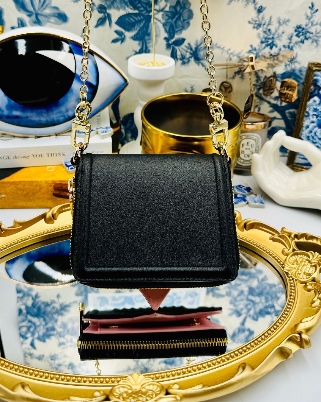 Black Chiara Ferragni Eyelike wallet on chain, back view