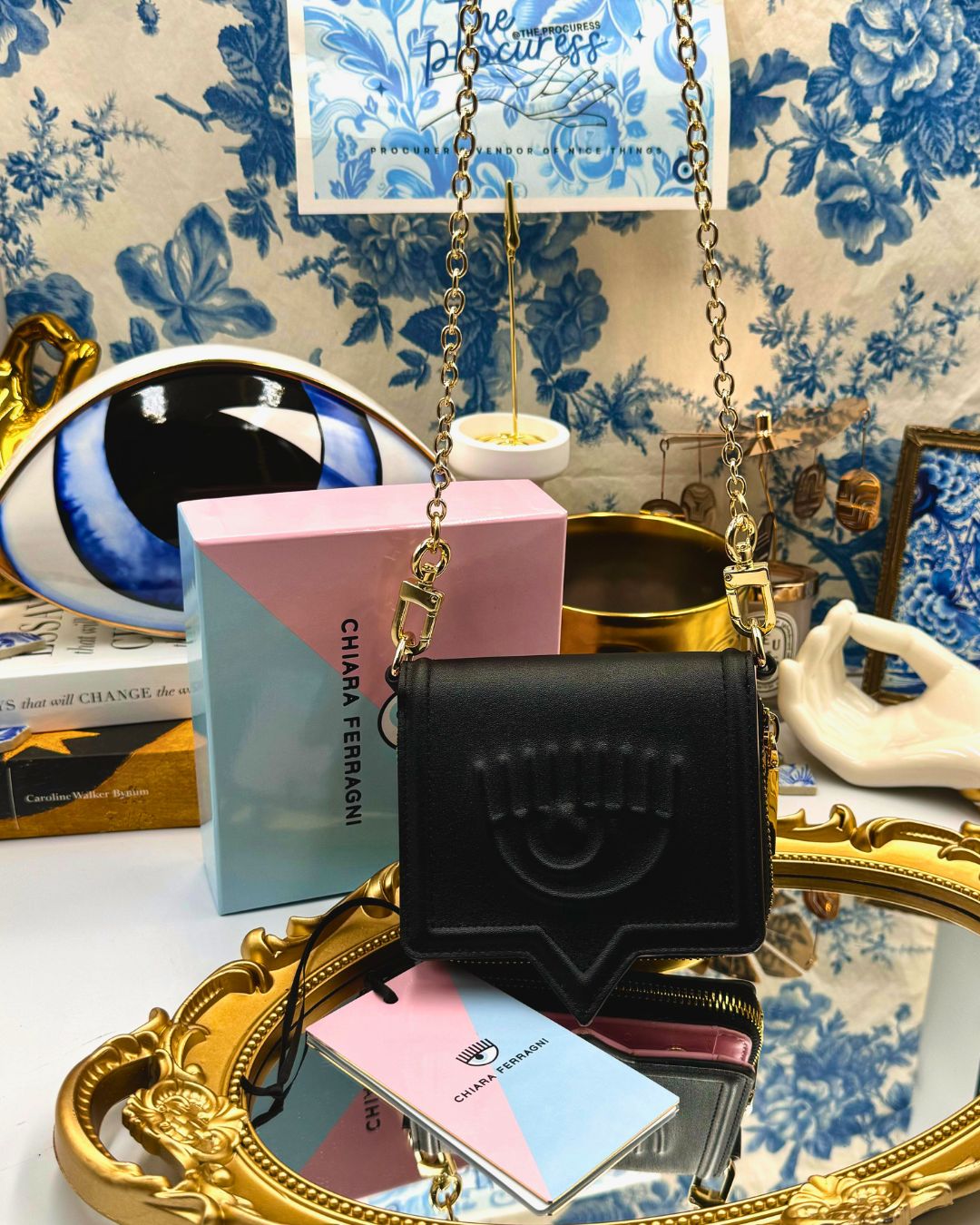 Black Chiara Ferragni Eyelike wallet on chain, front view