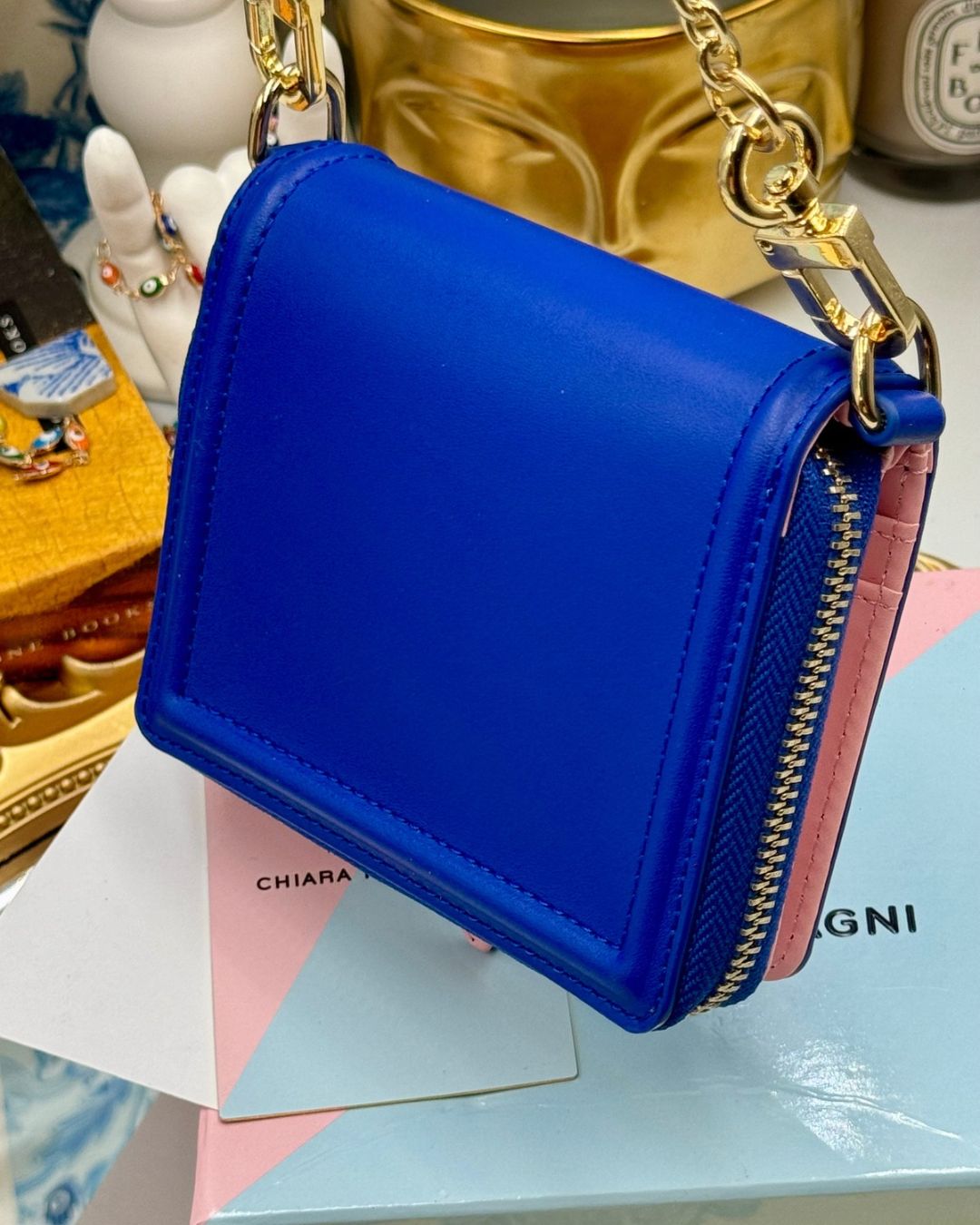Back view of blue CHIARA FERRAGNI Eyelike Wallet on Chain