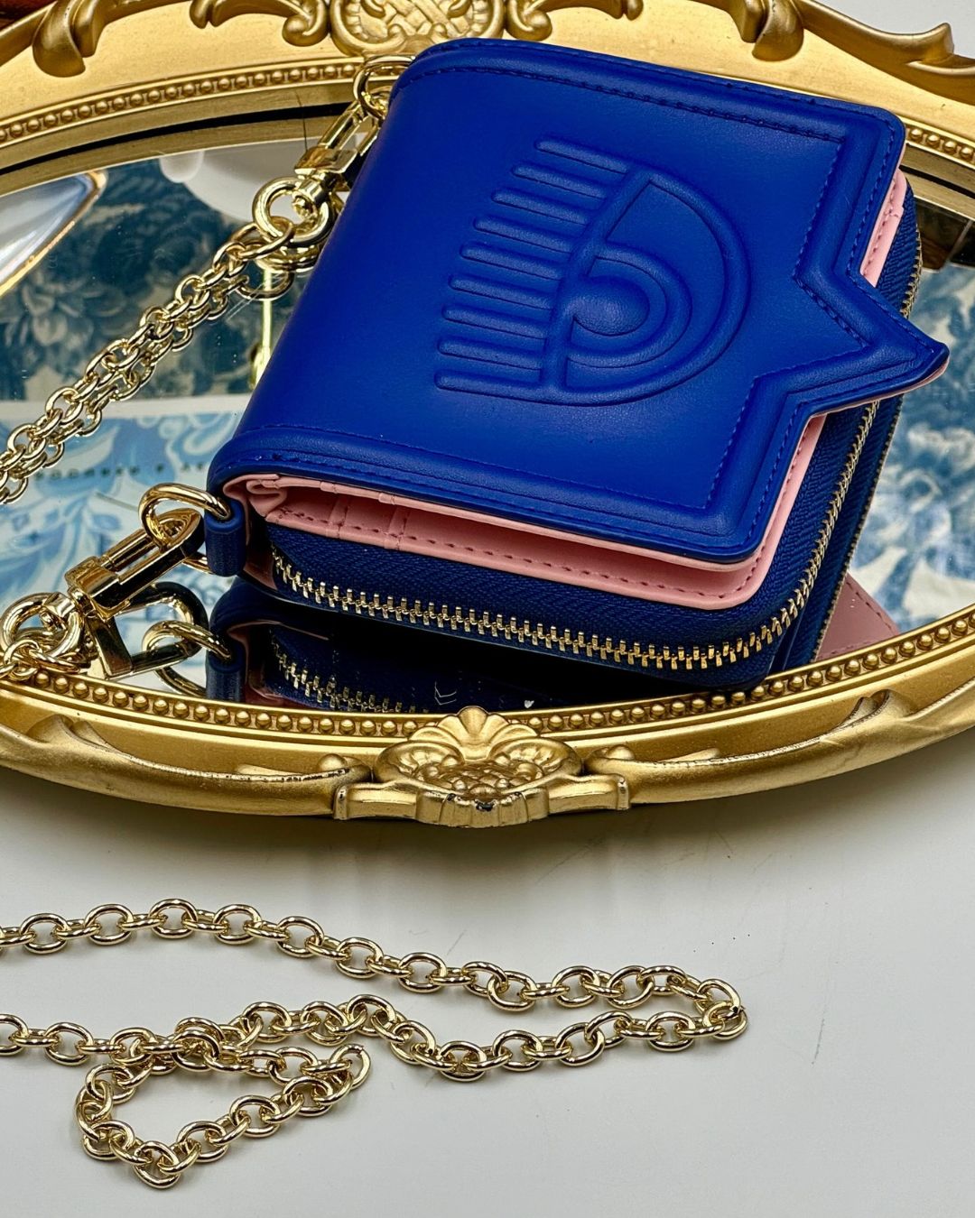 Chain strap on blue CHIARA FERRAGNI Eyelike Wallet on Chain