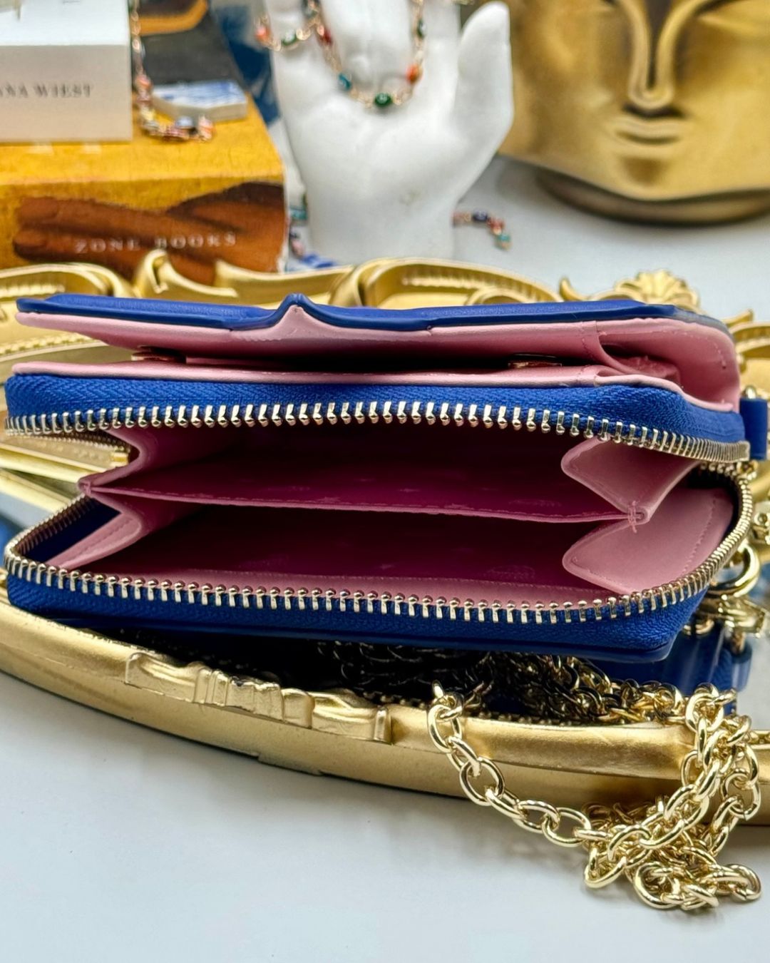 Interior of blue CHIARA FERRAGNI Eyelike Wallet on Chain