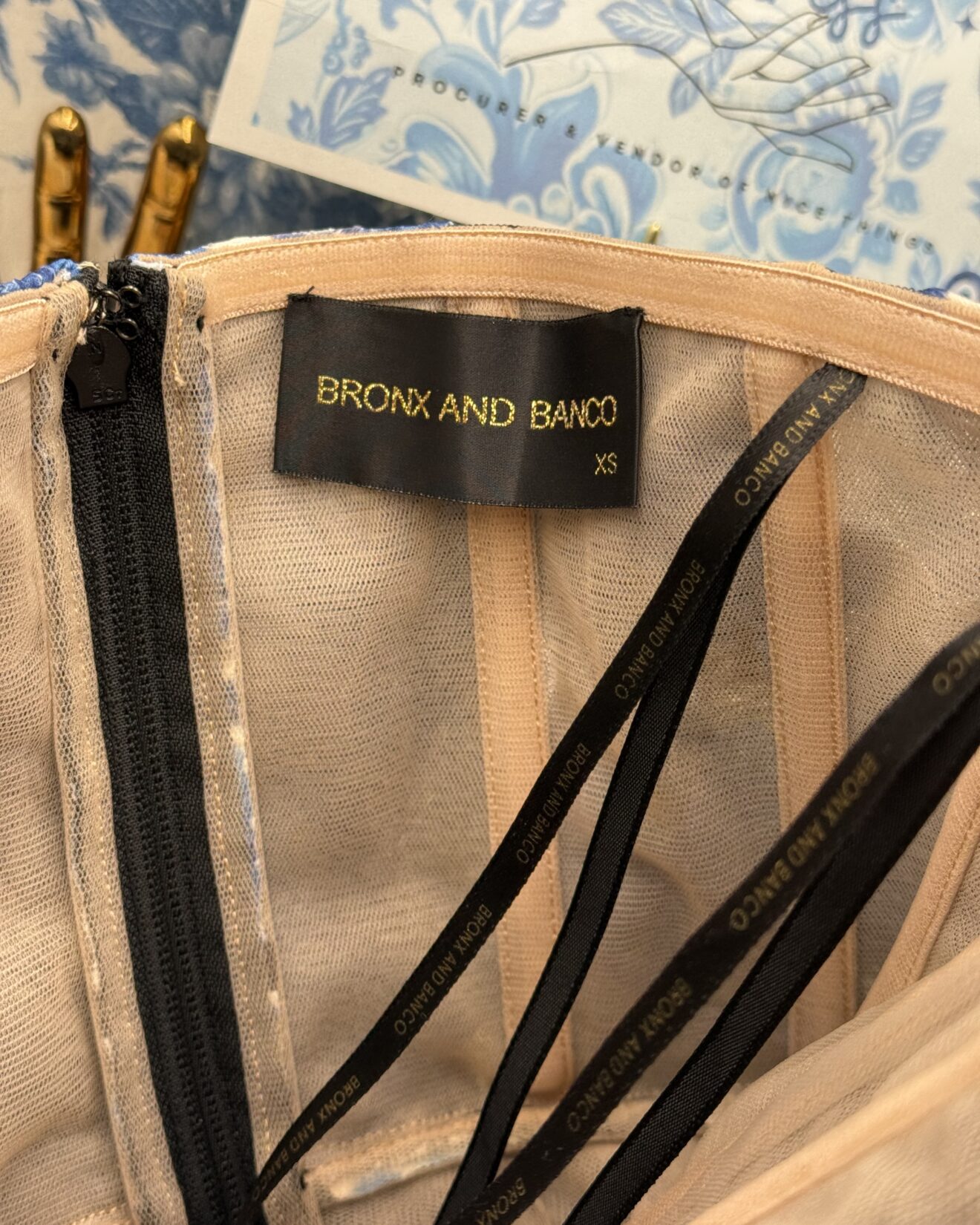 BRONX AND BANCO Cassandra Gown in black and blue floral tulle, label tag