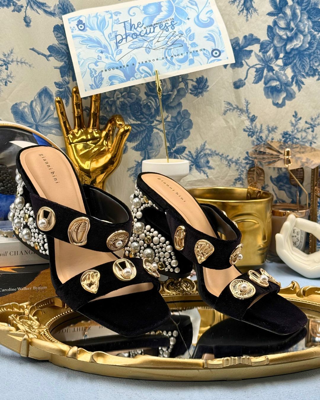 Pair of black GIANNI BINI Penei velvet pearl sandals