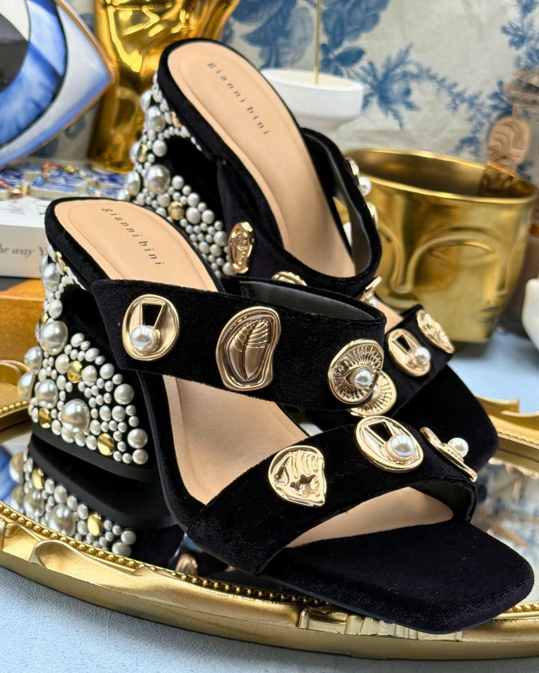 Side view of black GIANNI BINI Penei velvet pearl sandals