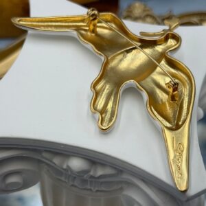 Reverse of SCHIAPARELLI museum collection dove brooch with pin fastening