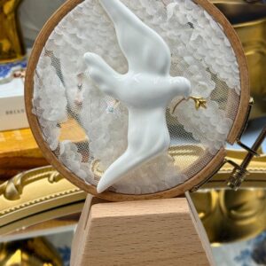 Front profile of SCHIAPARELLI museum collection white dove brooch