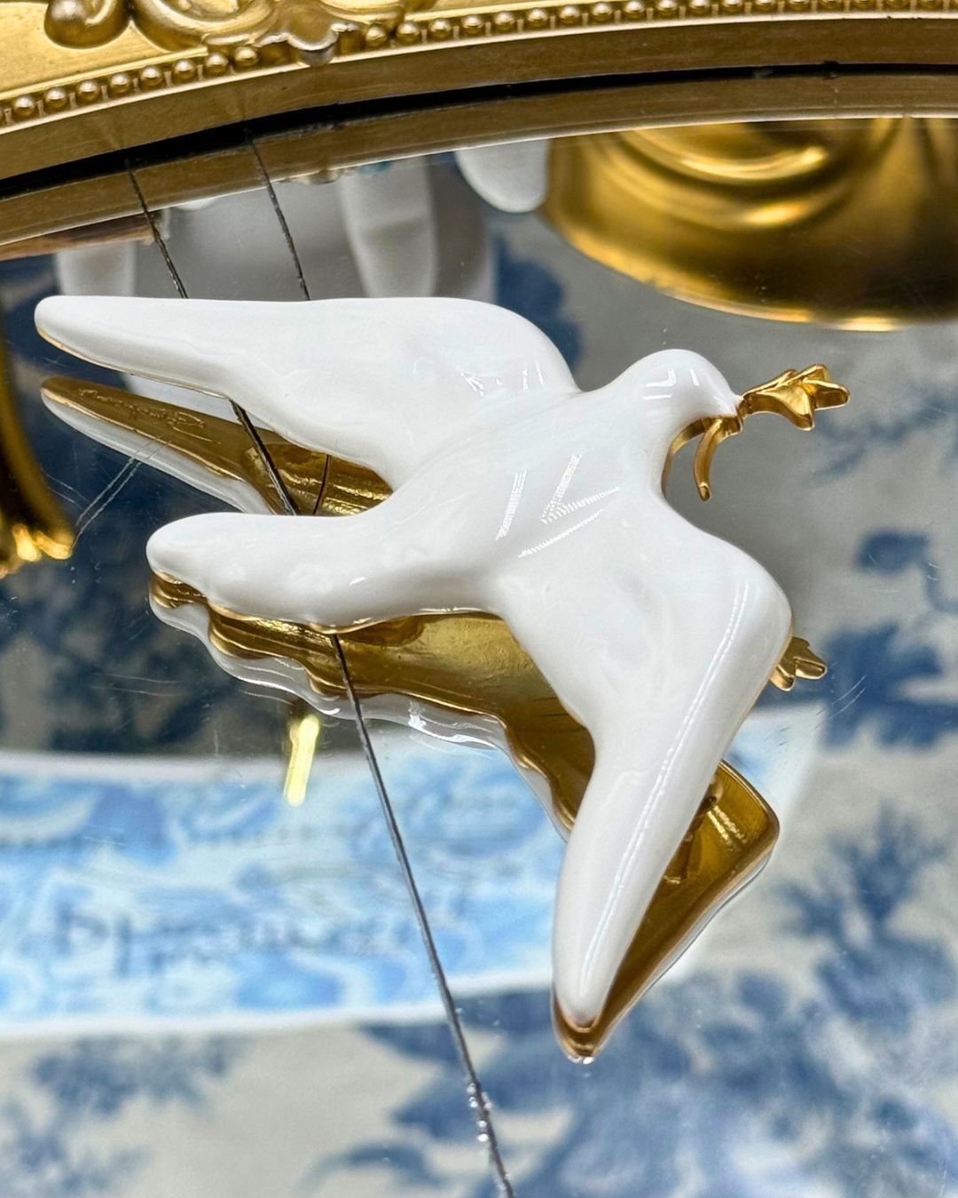 White SCHIAPARELLI museum collection dove brooch with gold-tone olive branch