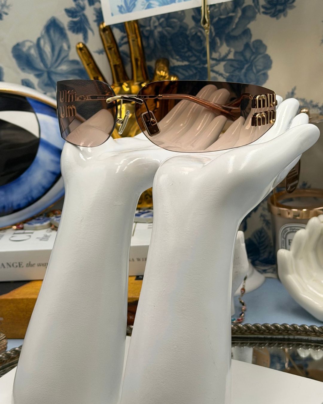 MIU MIU A51S rimless sunglasses with bronze lenses and gold-tone metal frame