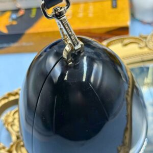 Silver-tone engraved hardware on SIMONE ROCHA Egg Clutch