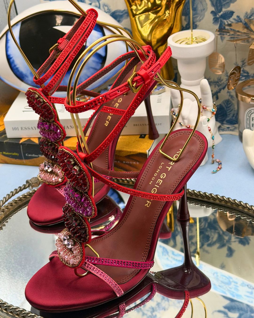 Side view of KURT GEIGER LONDON Kurt Kiss red satin
