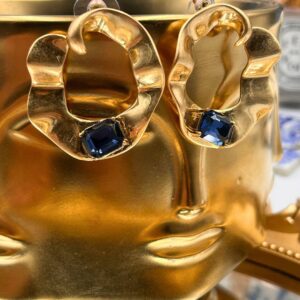 Pair of OSCAR DE LA RENTA sculptural gold O earrings with blue stones