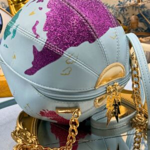 Angled view showing the spherical shape of BETSEY JOHNSON globe bag
