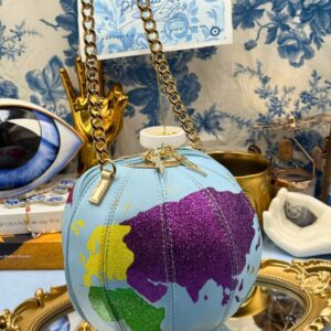 Front view showing the spherical shape of BETSEY JOHNSON globe bag