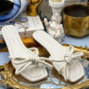 Pair of LOEFFLER RANDALL Hadley white leather bow sandals