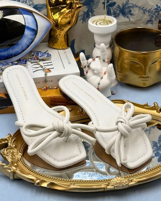 Pair of LOEFFLER RANDALL Hadley white leather bow sandals