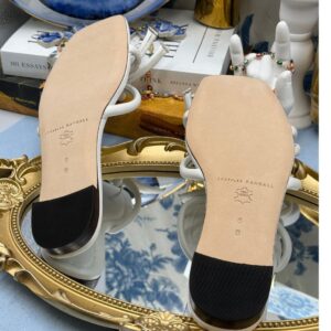 Leather outsole of LOEFFLER RANDALL Hadley white bow sandal