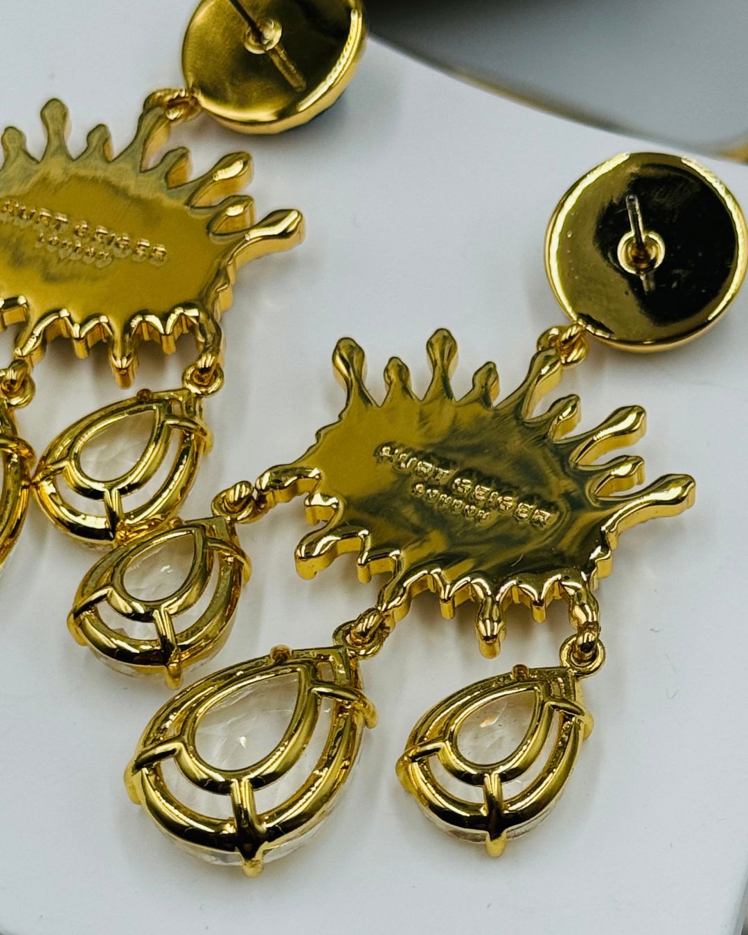 Reverse of KURT GEIGER LONDON Evil Eye chandelier earrings