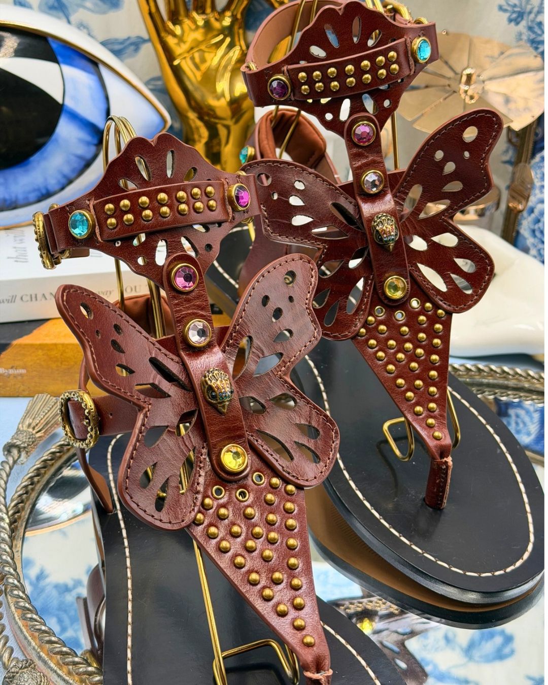 Pierced brown leather butterfly wing detail on KURT GEIGER LONDON sandal