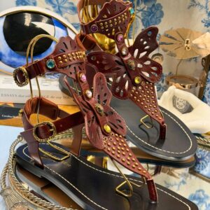 Side view of KURT GEIGER LONDON Boho Butterfly Gladiator sandal