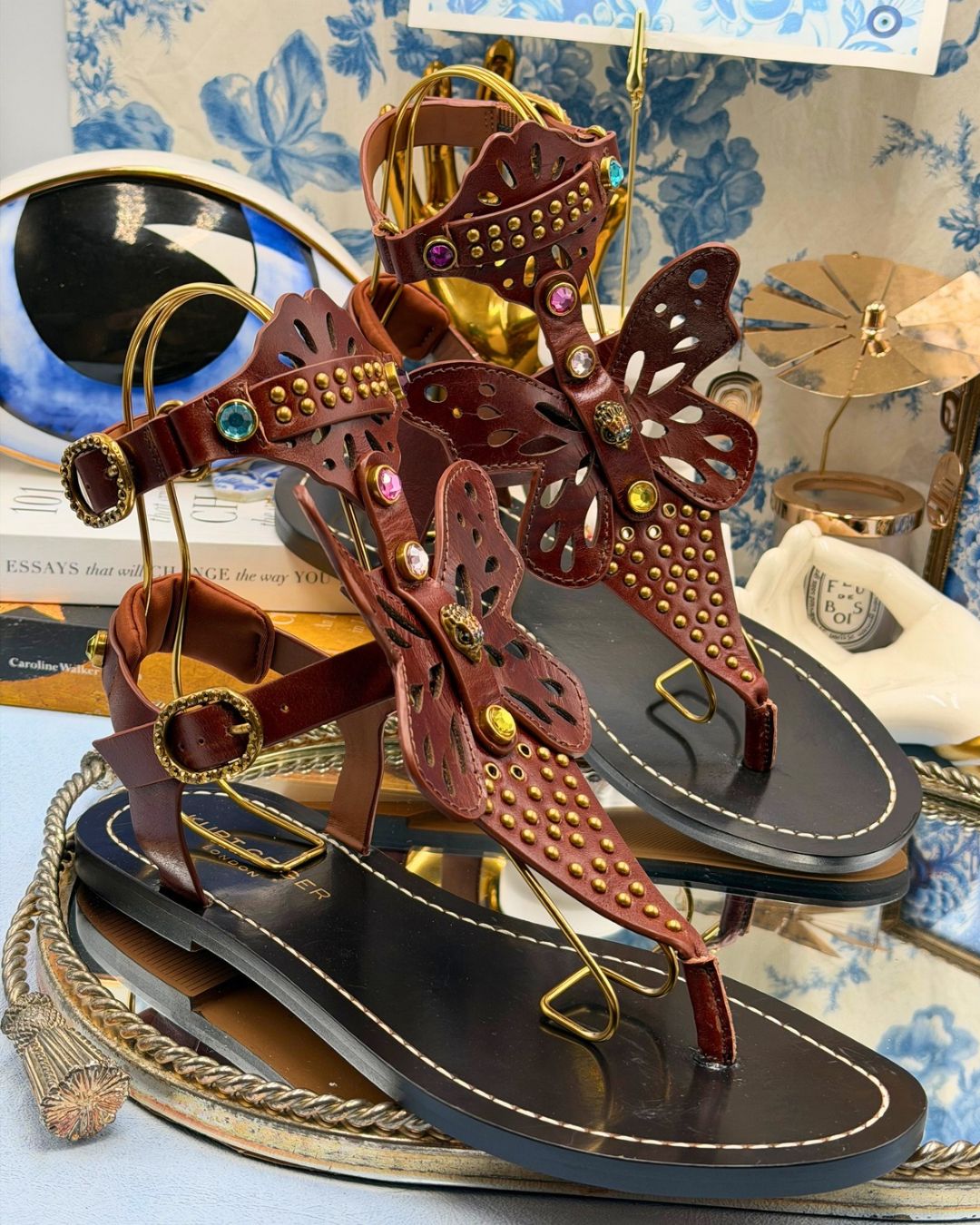 Side view of KURT GEIGER LONDON Boho Butterfly Gladiator sandal