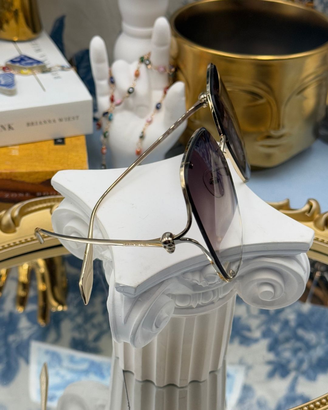 ALEXANDER McQUEEN AM0366S butterfly sunglasses in gold-tone metal with brown gradient lenses, side view
