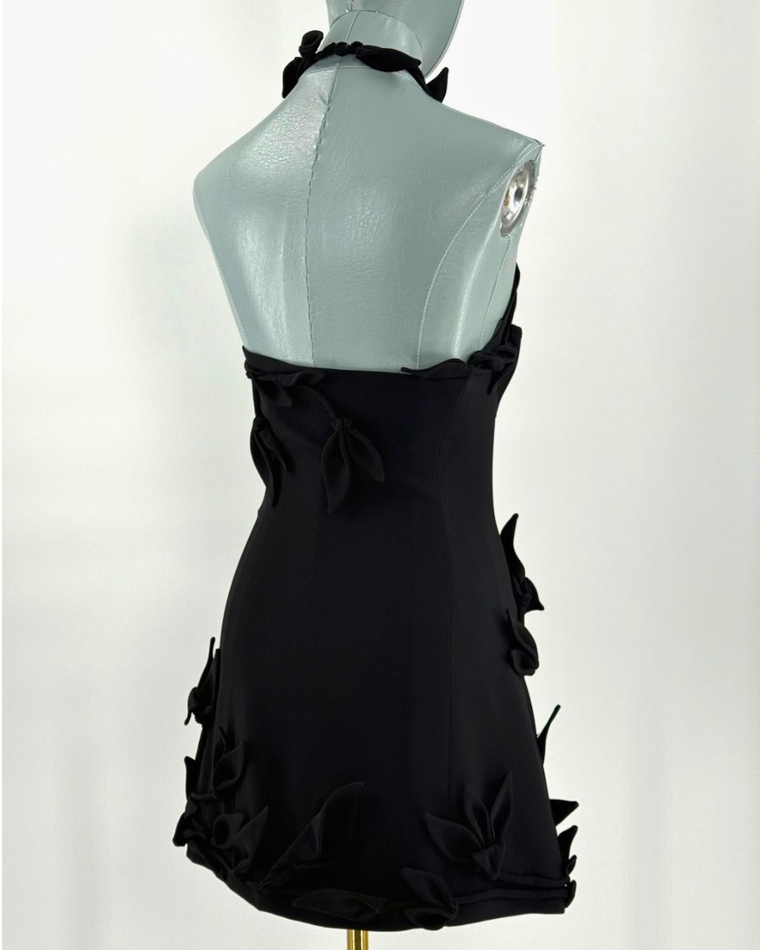 Back view of black CULT GAIA Elliana Calla Lily Mini Dress