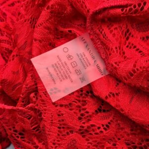 Composition and care label inside ALEXANDRA MIRO Kara Lace Kaftan
