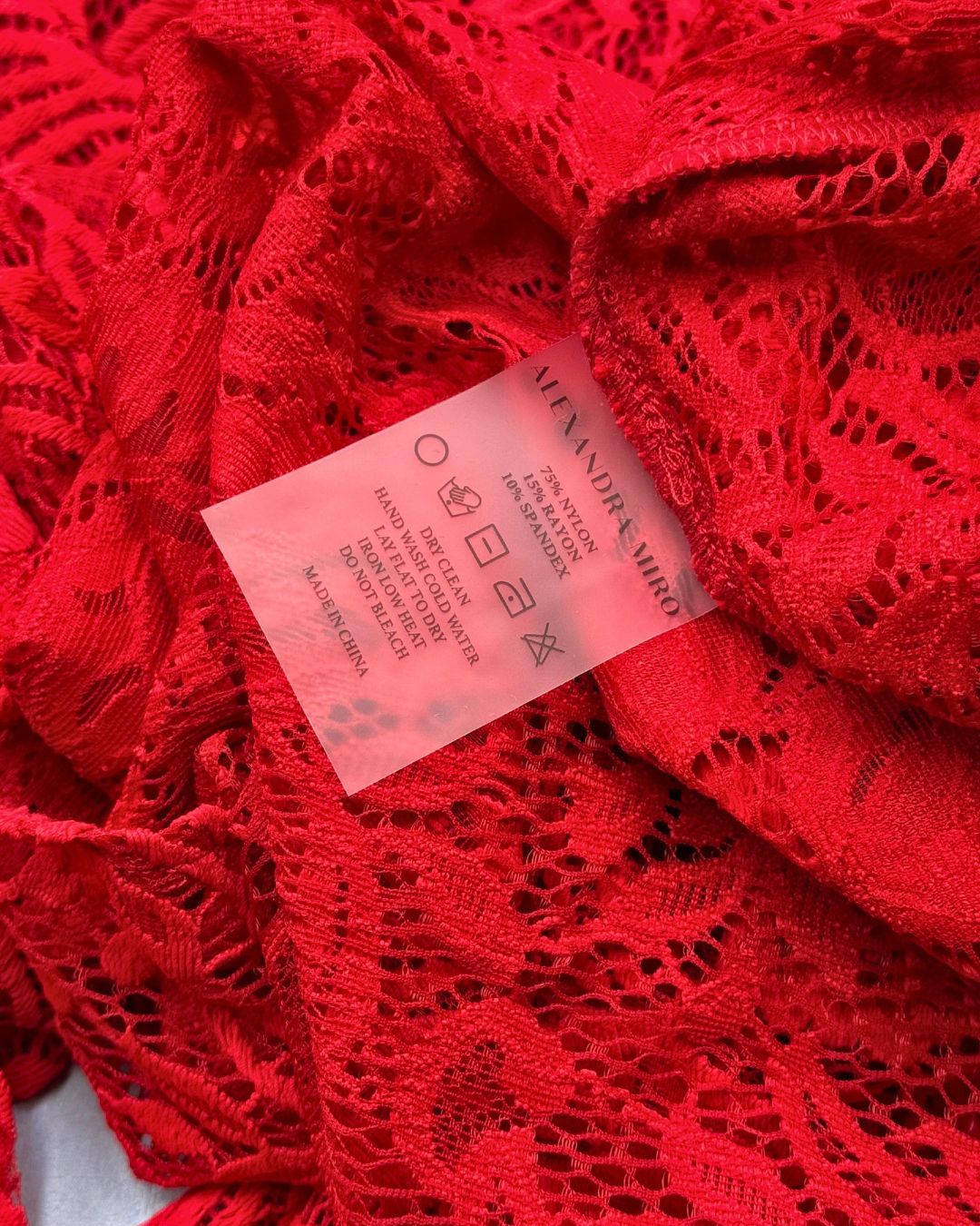 Composition and care label inside ALEXANDRA MIRO Kara Lace Kaftan
