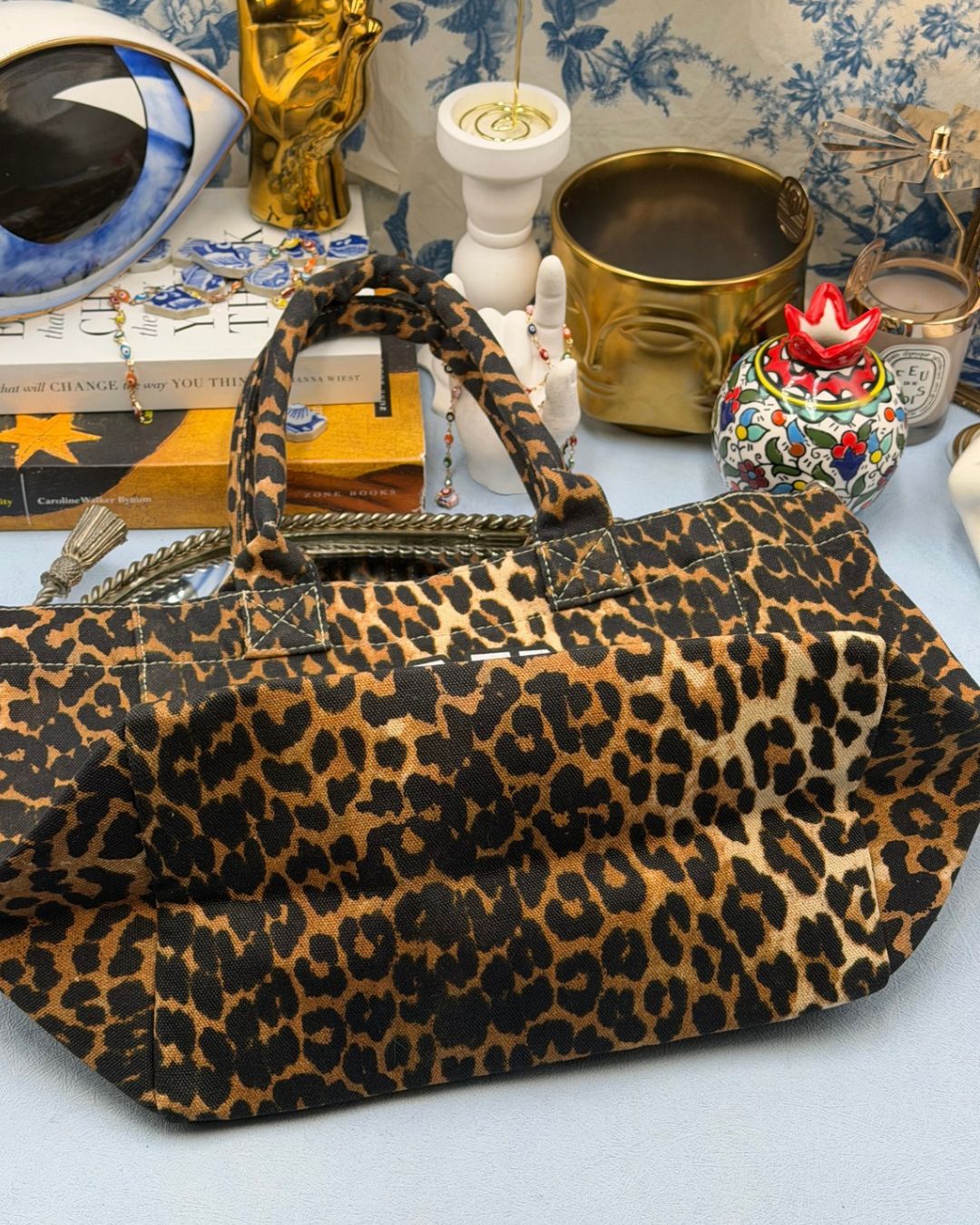 Bottom of of GANNI x DISNEY Daisy Duck Leopard Small Tote