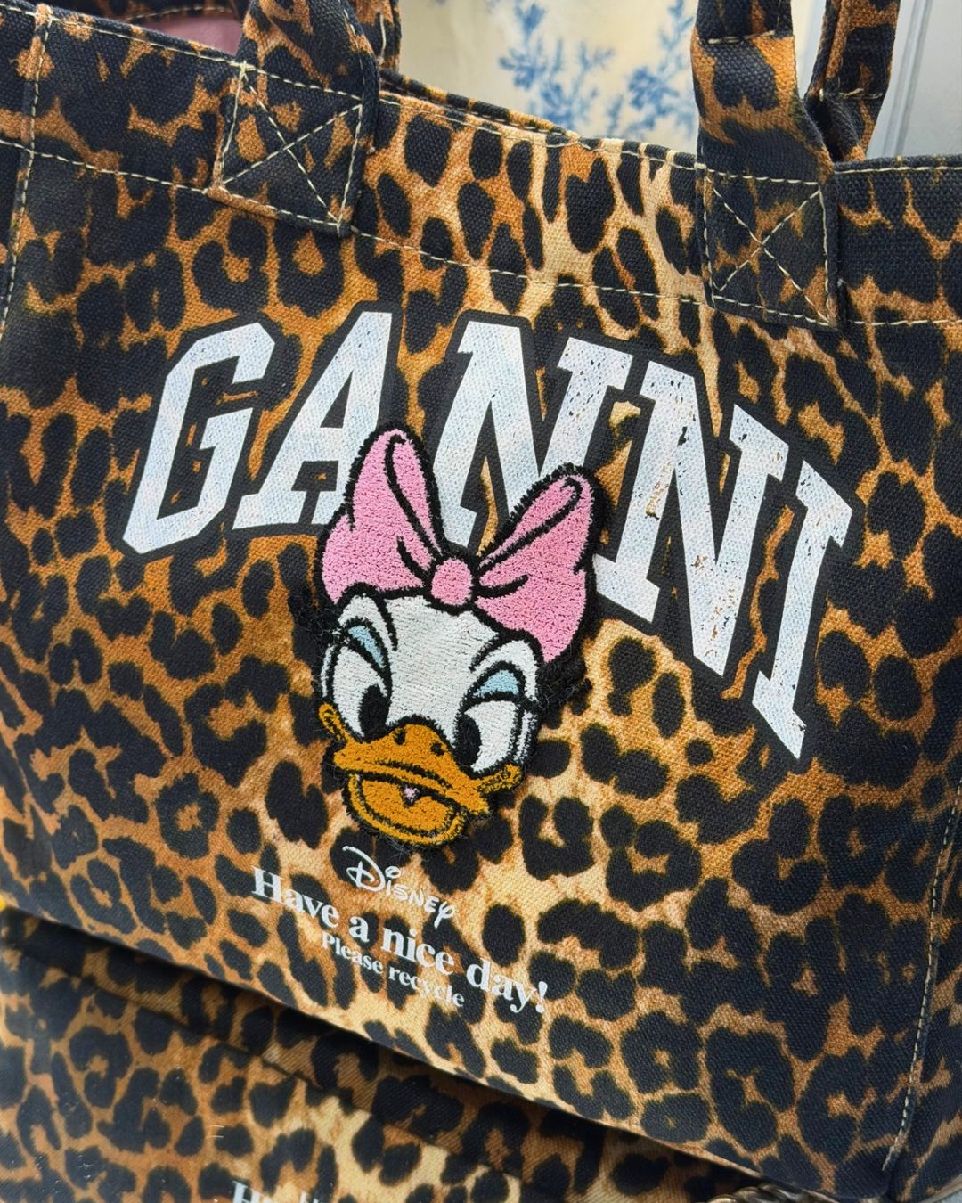 Carpet-tufted Daisy Duck motif on GANNI x DISNEY Leopard Small Tote