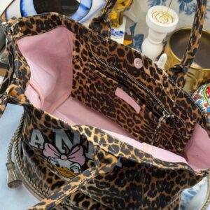 Pink interior of GANNI x DISNEY Daisy Duck Leopard Small Tote