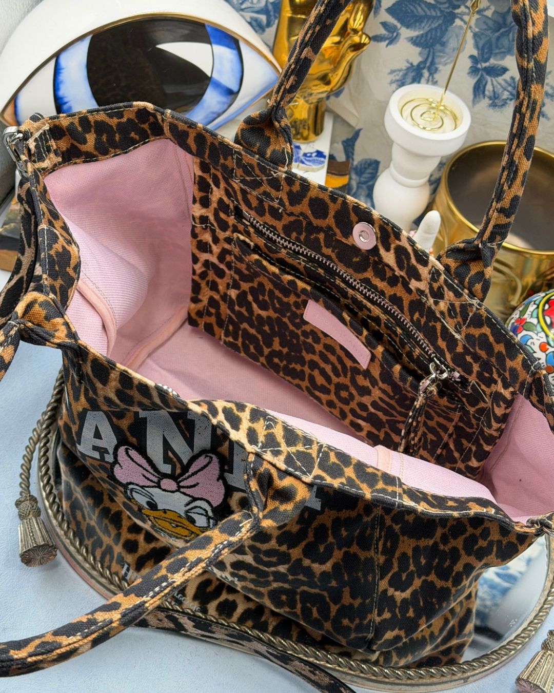 Pink interior of GANNI x DISNEY Daisy Duck Leopard Small Tote