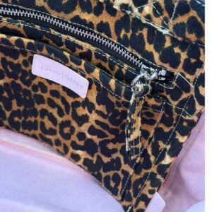 Interior zip and patch pockets of GANNI x DISNEY Daisy Duck Leopard Small Tote