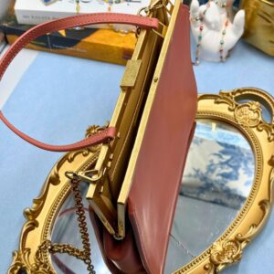 Open view of Black OROTON Icon Frame Clutch