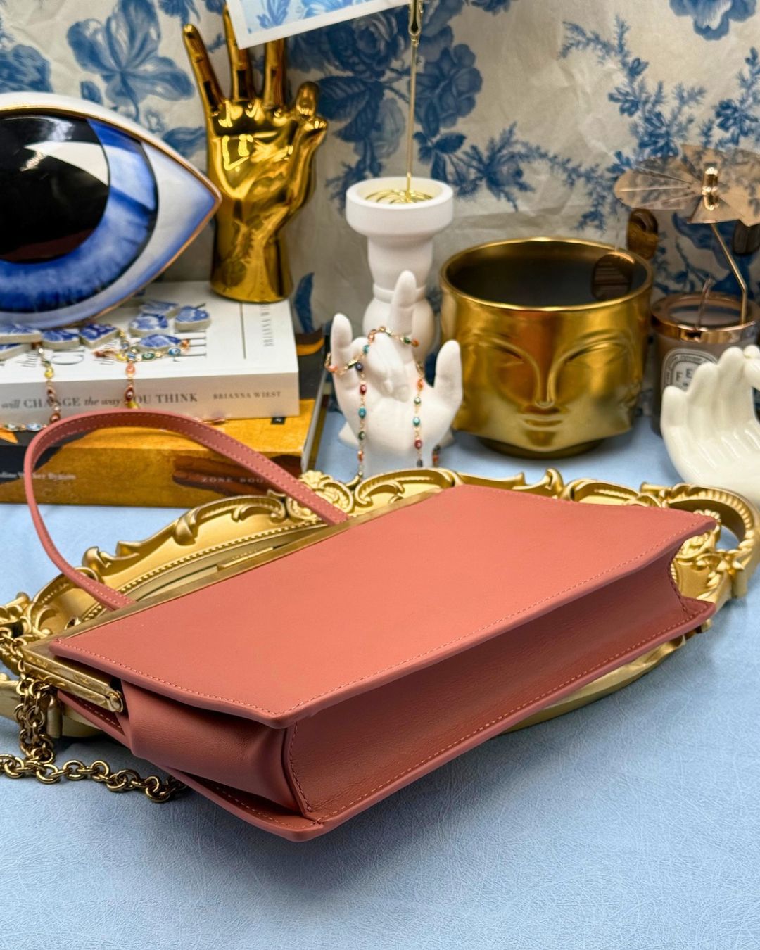 Bottom of Rosewood Pink OROTON Icon Frame Clutch