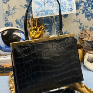 Short leather top handle on OROTON Icon Frame Croco Clutch