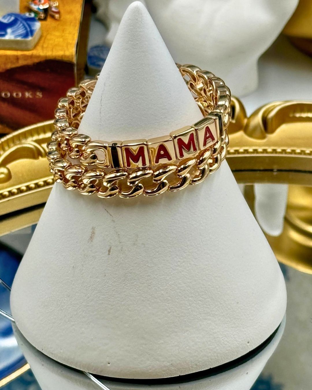 ROXANNE ASSOULIN MAMA Link bracelets stacked together