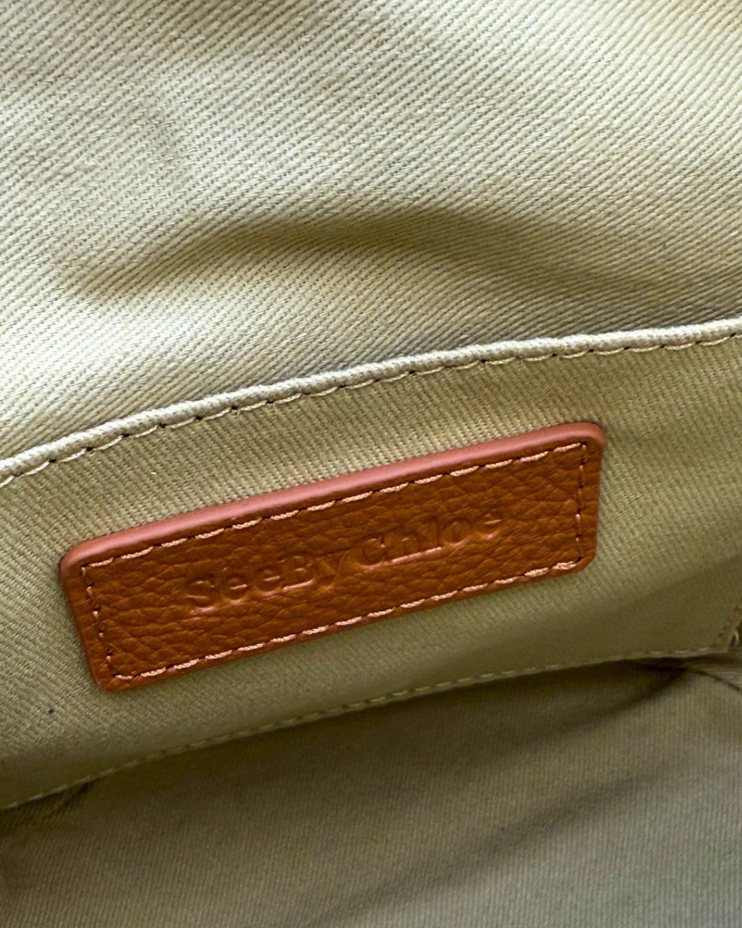 SEE BY CHLOÉ branding inside Vicki Bucket Bag