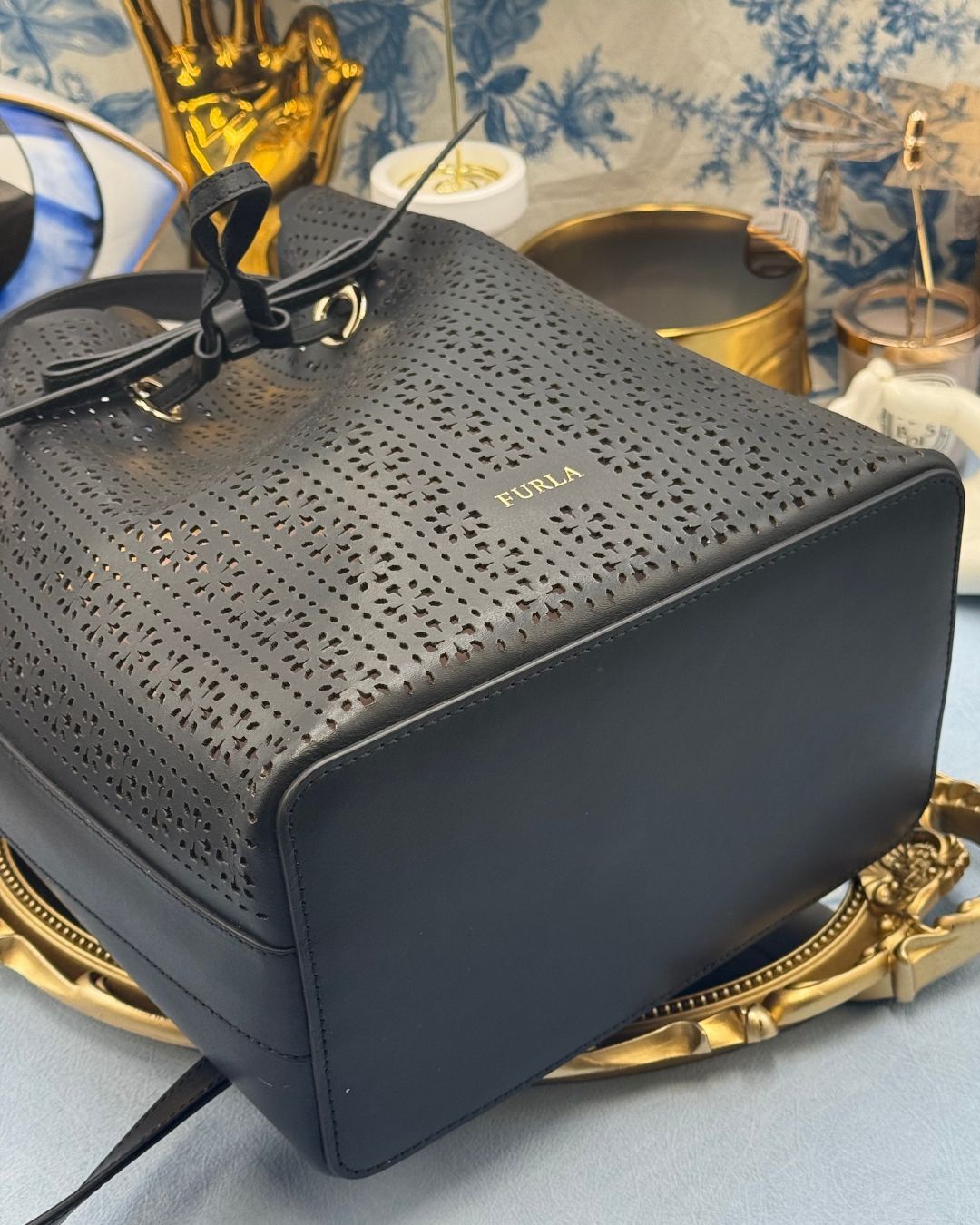 Bottom view of FURLA Constanza Black Leather Bucket Bag