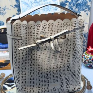 FURLA Constanza Laser-Cut Leather Bucket Bag in Chalk, front view