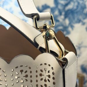 View of FURLA Constanza Chalk Leather Bucket Bag logo hardware