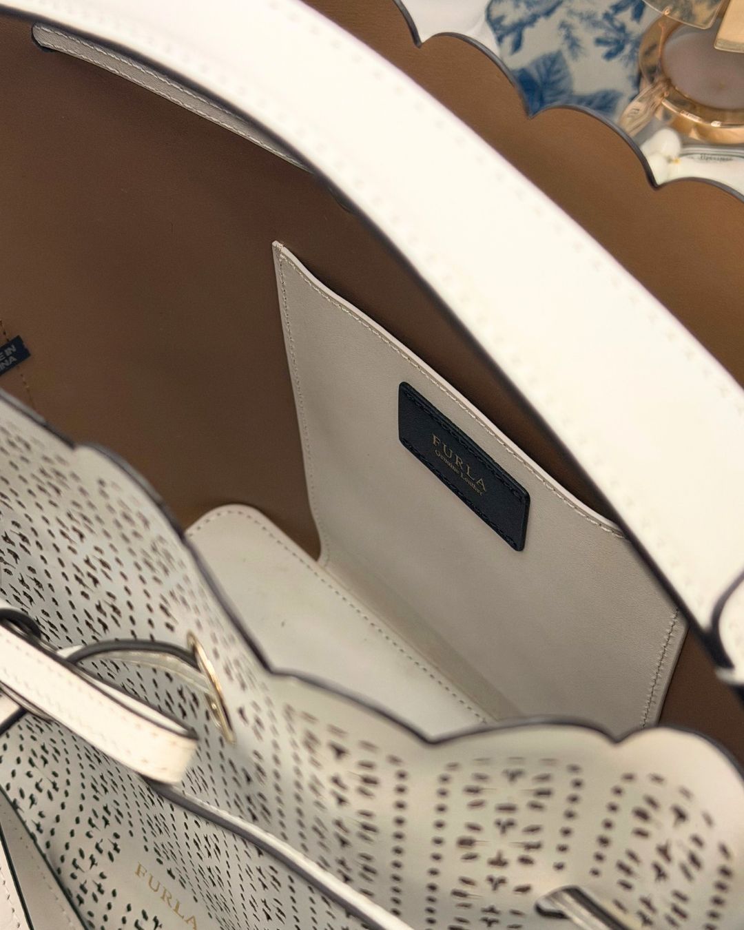 Interior view of FURLA Constanza Chalk Leather Bucket Bag