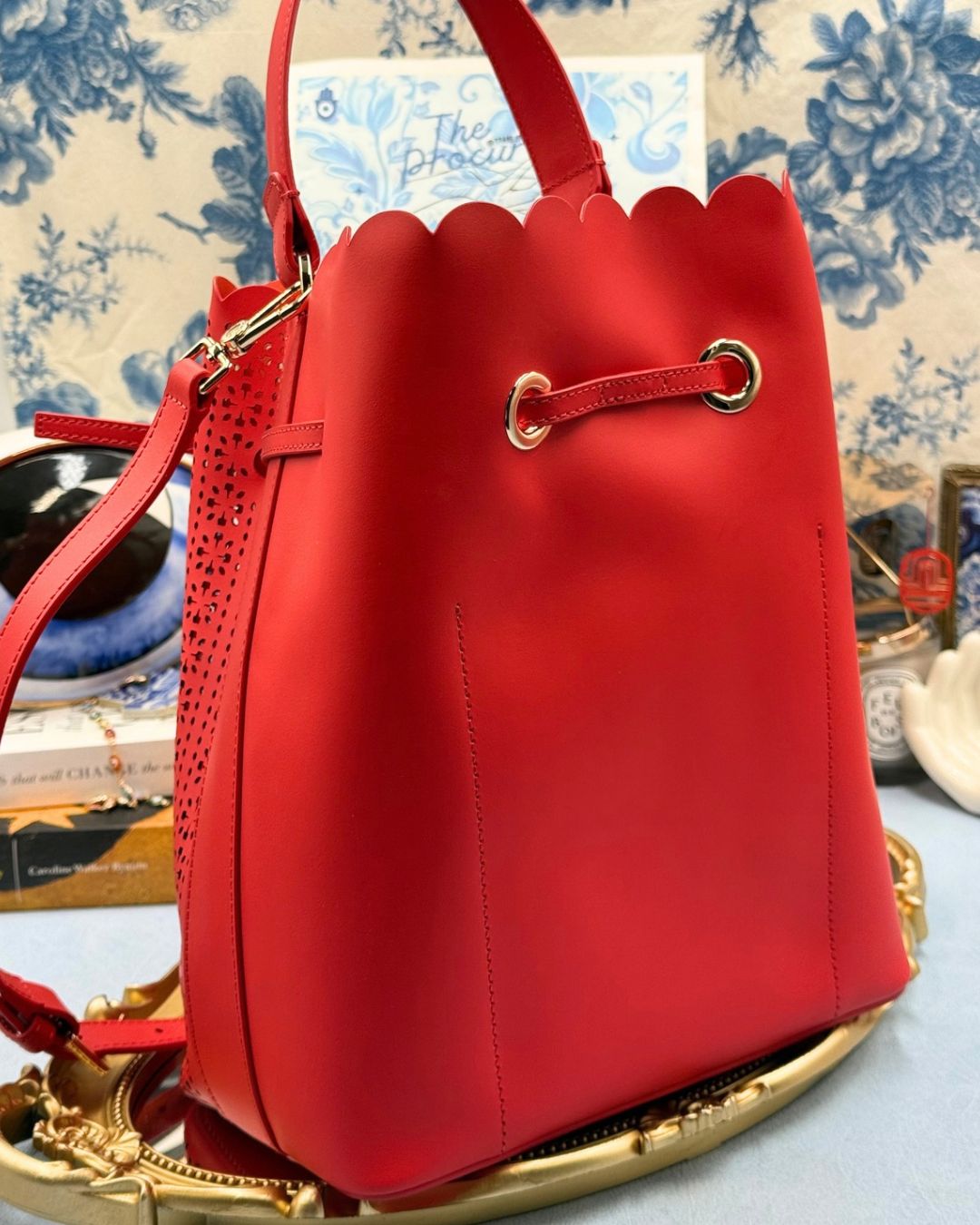 Back view of FURLA Constanza Red Laser-Cut Leather Bucket Bag
