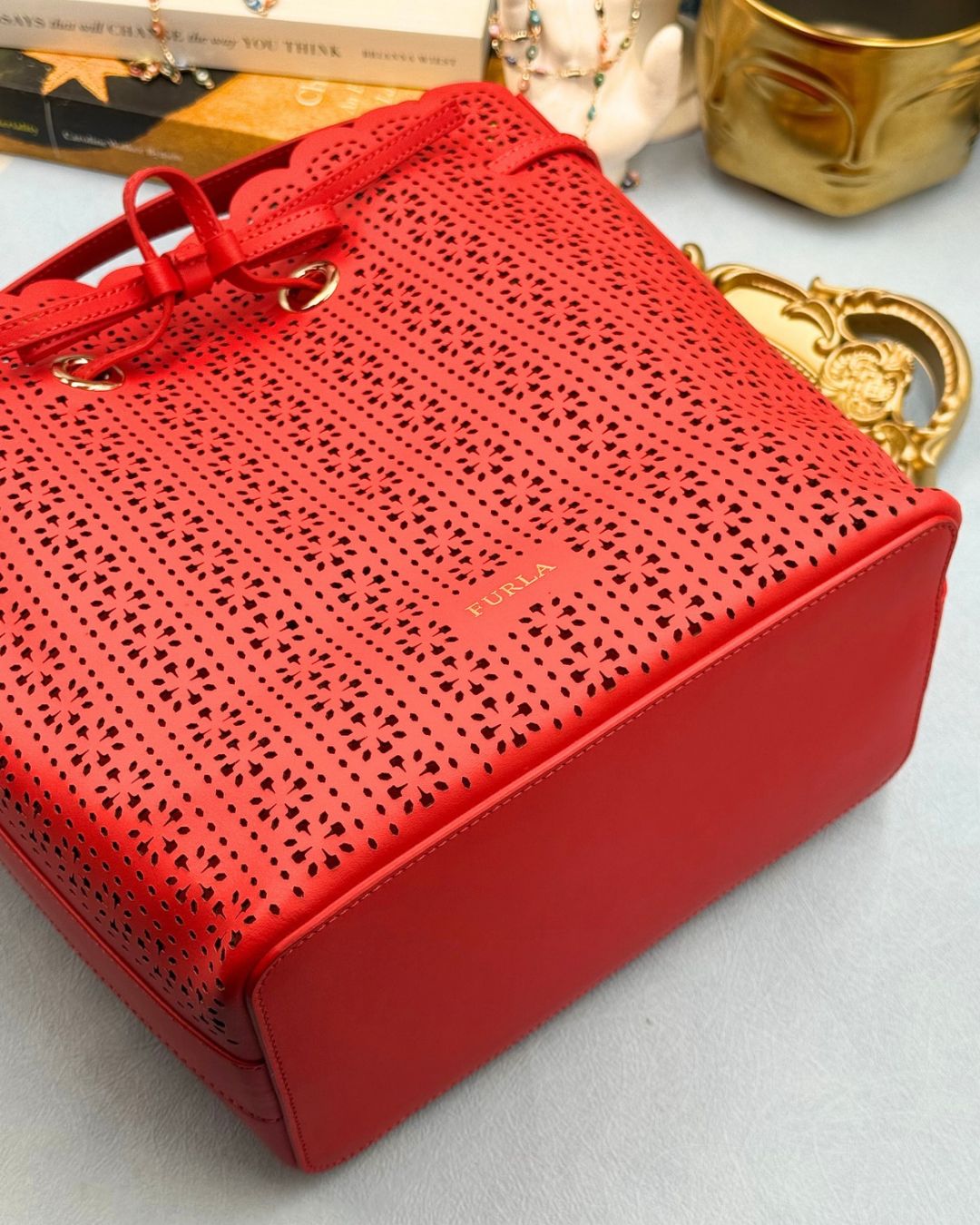 Bottom view of FURLA Constanza Red Leather Bucket Bag