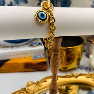 14k gold-plated oval-link chain on LELE SADOUGHI Evil Eye Bracelet