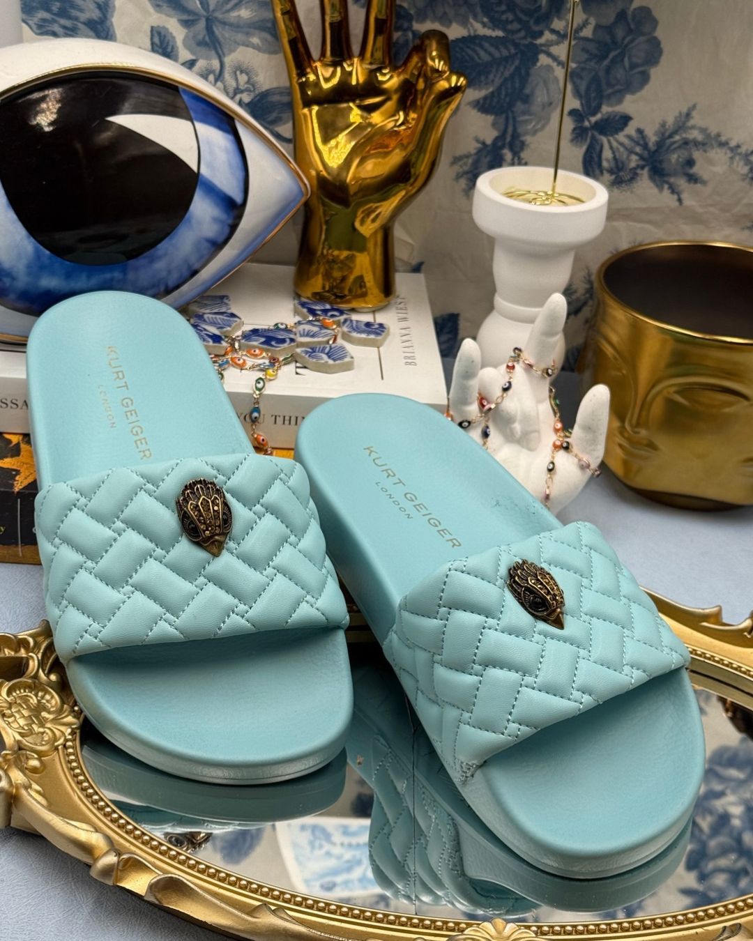 KURT GEIGER LONDON Meena Eagle Quilted Pool Slides in Blue