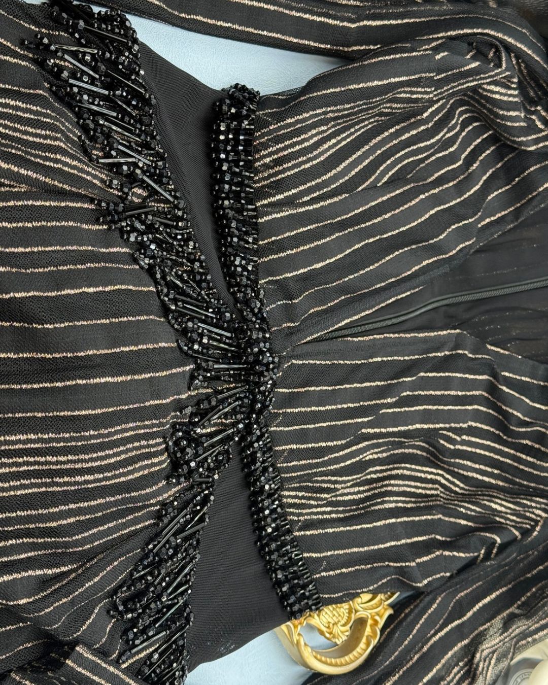Black and gold beaded waist detail on PATBO Prism Lurex Gown