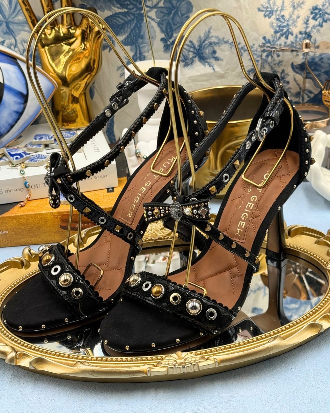 Bow, faux pearl, stud and eyelet details on KURT GEIGER LONDON black suede sandal