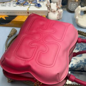 Embroidered GANNI logo and padded recycled-leather construction in Pink Gradient